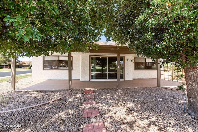 347 Leisure World, Mesa, AZ 85206 - rear view of property with stucco siding and a patio area