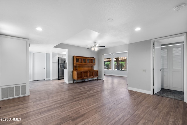 347 Leisure World, Mesa, AZ 85206 - unfurnished living room with ceiling fan, baseboards, wood finished floors, and recessed lighting