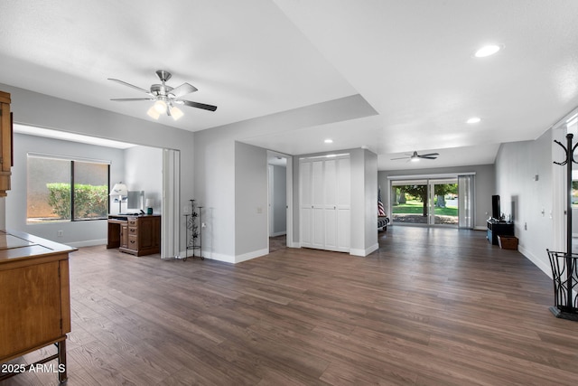 347 Leisure World, Mesa, AZ 85206 - unfurnished living room with ceiling fan, dark wood-type flooring, recessed lighting, and baseboards