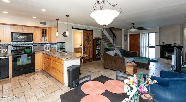 kitchen featuring black appliances, hanging light fixtures, ceiling fan, decorative backsplash, and kitchen peninsula