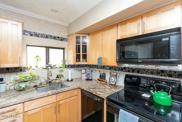 kitchen with black appliances, decorative backsplash, light brown cabinets, and sink