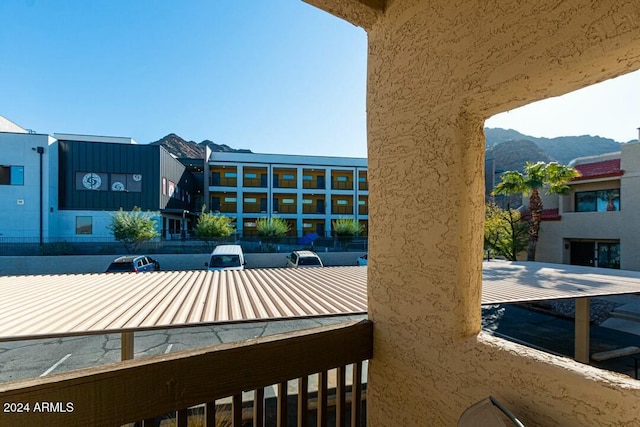 balcony featuring a mountain view