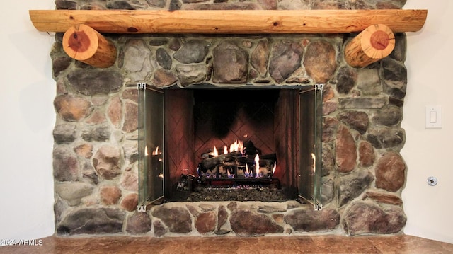 details featuring a stone fireplace