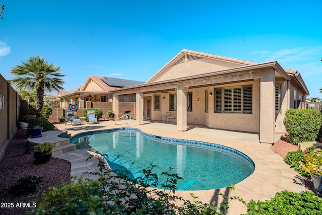 view of pool with a fenced backyard, a fenced in pool, and a patio