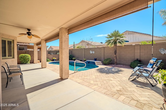 view of patio with ceiling fan, a fenced backyard, and a fenced in pool