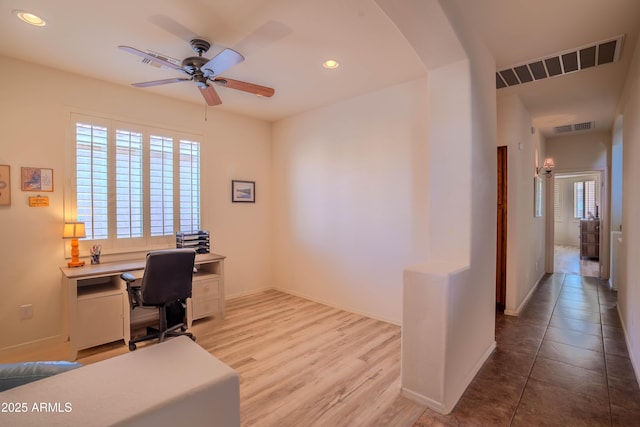 office space with visible vents, a ceiling fan, and recessed lighting