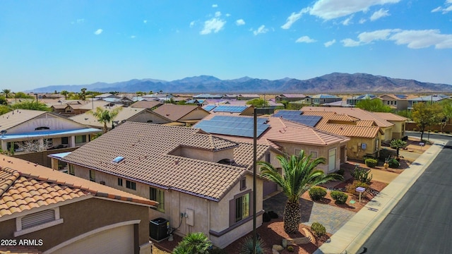 birds eye view of property with a residential view and a mountain view