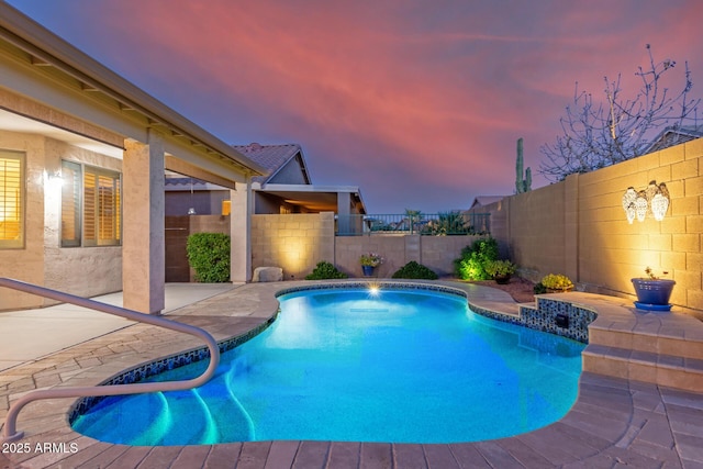 view of swimming pool with a fenced in pool, a patio area, and a fenced backyard