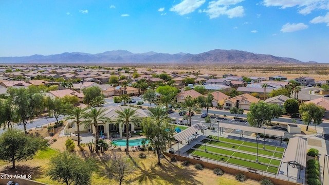 drone / aerial view featuring a residential view and a mountain view