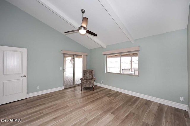 unfurnished room with beamed ceiling, ceiling fan, wood-type flooring, and high vaulted ceiling