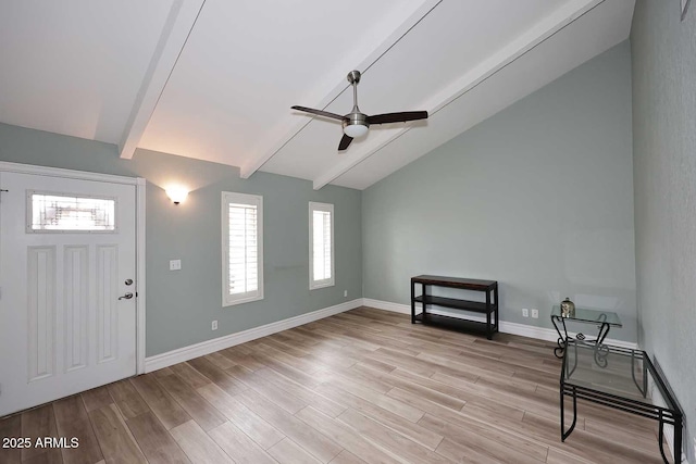 foyer with vaulted ceiling with beams, ceiling fan, and light hardwood / wood-style flooring