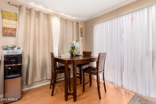 dining room with light hardwood / wood-style floors