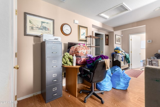 office space with hardwood / wood-style floors