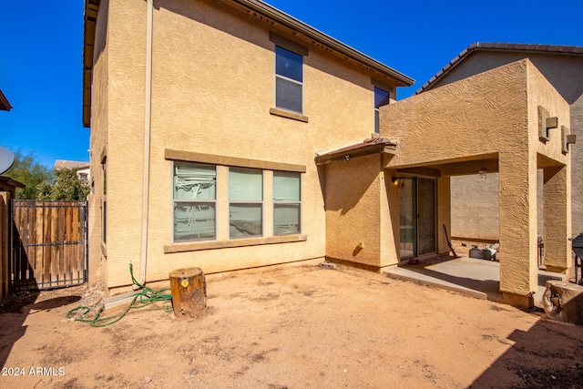 rear view of property with a patio