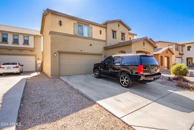 view of front of property featuring a garage