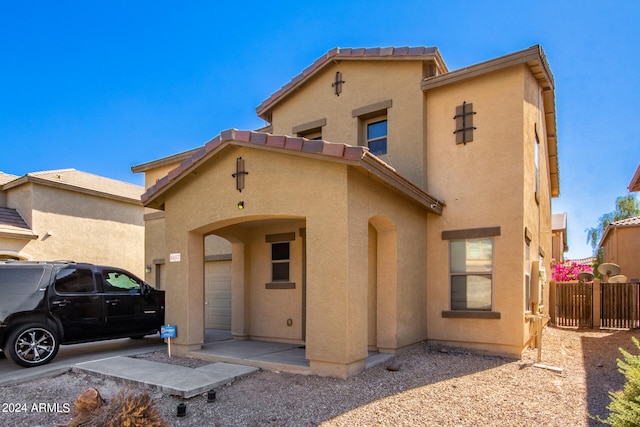 view of front of property with a garage