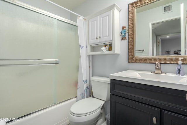 full bathroom with vanity, shower / bath combination with curtain, and toilet