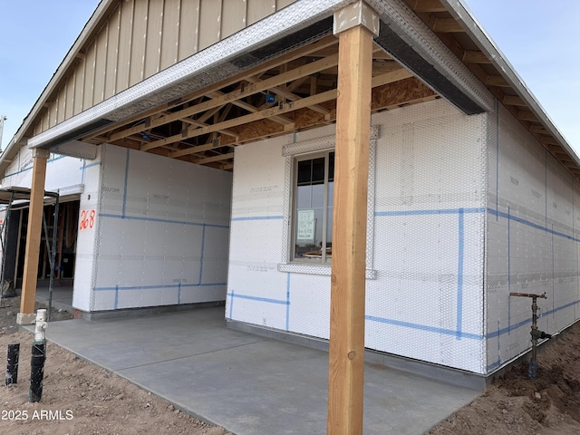 view of side of property featuring board and batten siding