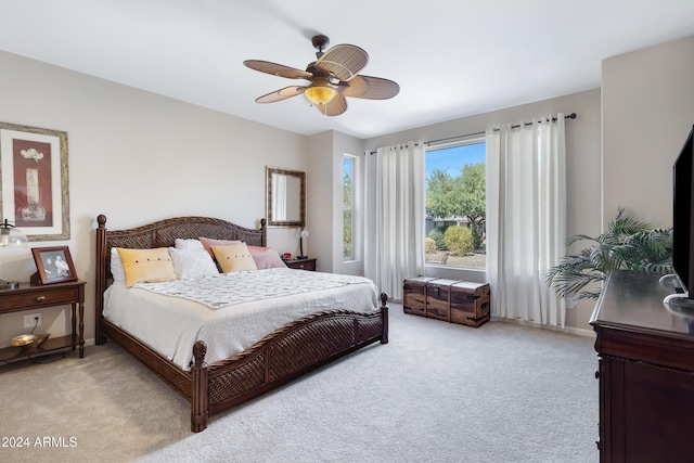 4422 W Adobe Dr, Eloy, AZ 85131 - bedroom with light carpet, ceiling fan, and baseboards