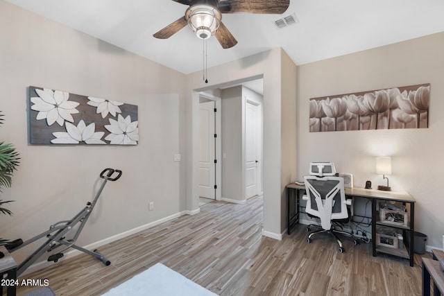 4422 W Adobe Dr, Eloy, AZ 85131 - home office featuring a ceiling fan, wood finished floors, and baseboards