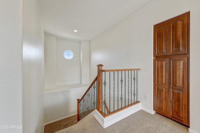 staircase with recessed lighting, carpet, and baseboards