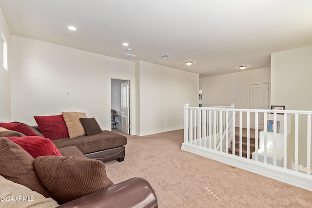 living room featuring light carpet