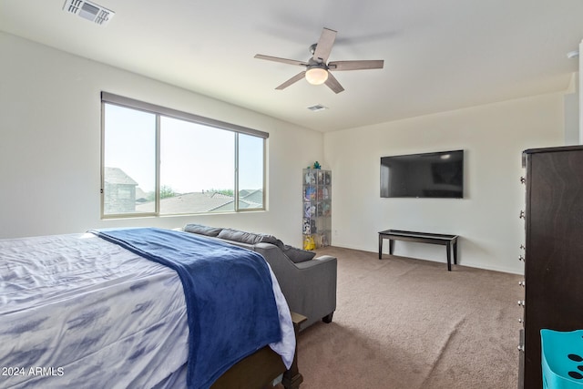 bedroom featuring ceiling fan and carpet floors