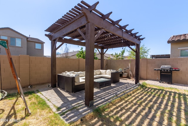 view of patio with a pergola, a grill, and an outdoor hangout area