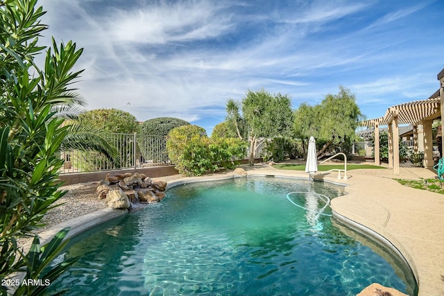 view of pool with a patio, a pergola, and pool water feature