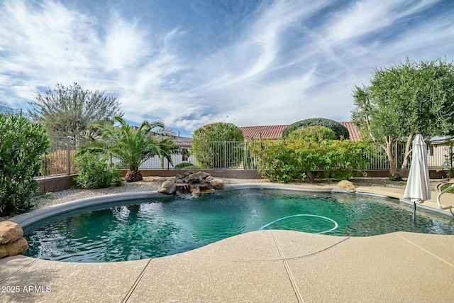 view of pool featuring a patio area