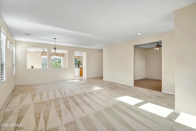 spare room featuring ceiling fan