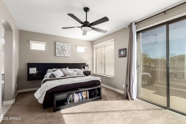 bedroom with carpet flooring, access to outside, and ceiling fan