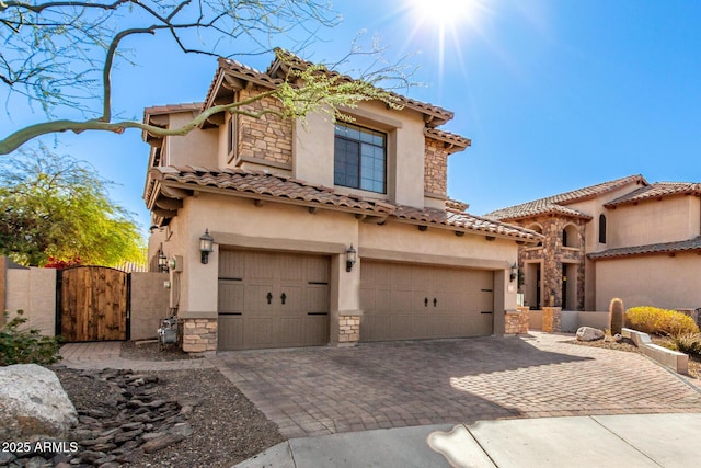 mediterranean / spanish house featuring a garage