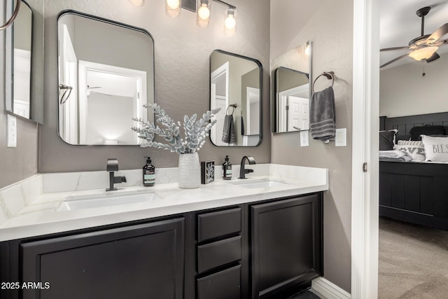 bathroom featuring vanity and ceiling fan