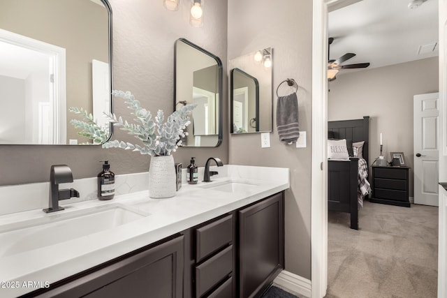 bathroom featuring vanity and ceiling fan