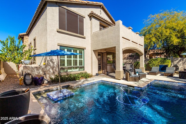 view of swimming pool with a patio