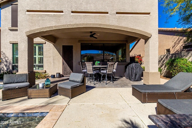 view of patio / terrace with ceiling fan and an outdoor hangout area