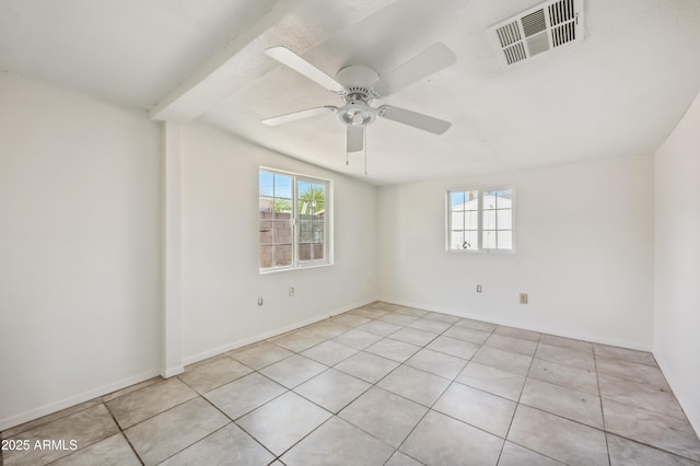 4441 S 8th St, Phoenix, AZ 85040 - tiled spare room featuring ceiling fan and baseboards