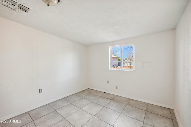 4441 S 8th St, Phoenix, AZ 85040 - spare room with light tile patterned flooring and baseboards