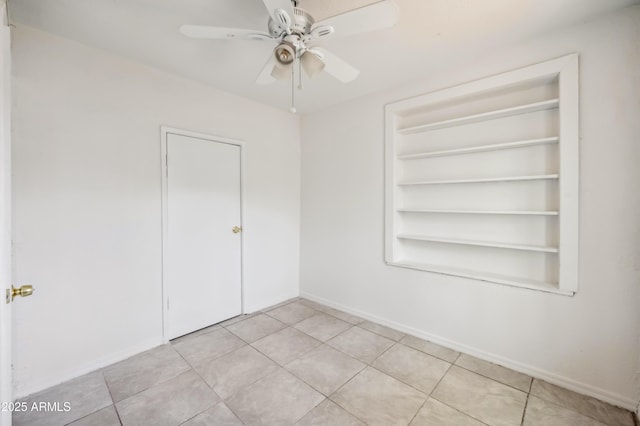 4441 S 8th St, Phoenix, AZ 85040 - empty room featuring a ceiling fan, baseboards, and built in features