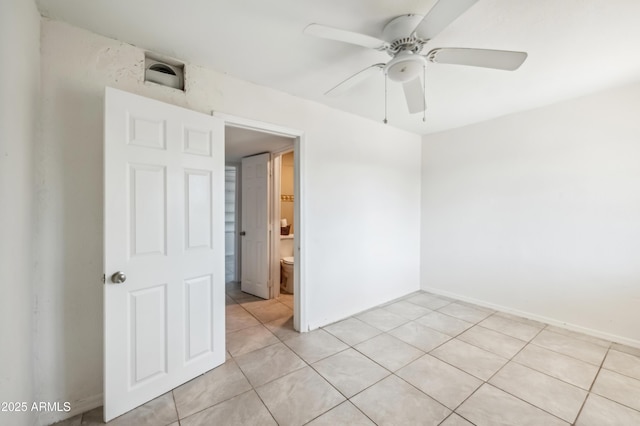 4441 S 8th St, Phoenix, AZ 85040 - empty room with ceiling fan and light tile patterned flooring