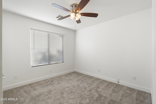 carpeted empty room with ceiling fan