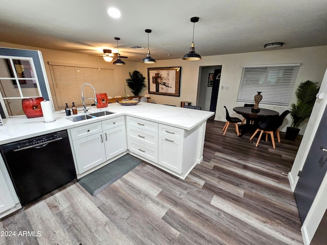 1801 N 87th Pl, Scottsdale, AZ 85257 - kitchen featuring black dishwasher, dark wood-type flooring, a peninsula, a ceiling fan, and white cabinets
