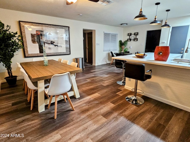 1801 N 87th Pl, Scottsdale, AZ 85257 - dining space featuring dark wood-style floors and baseboards