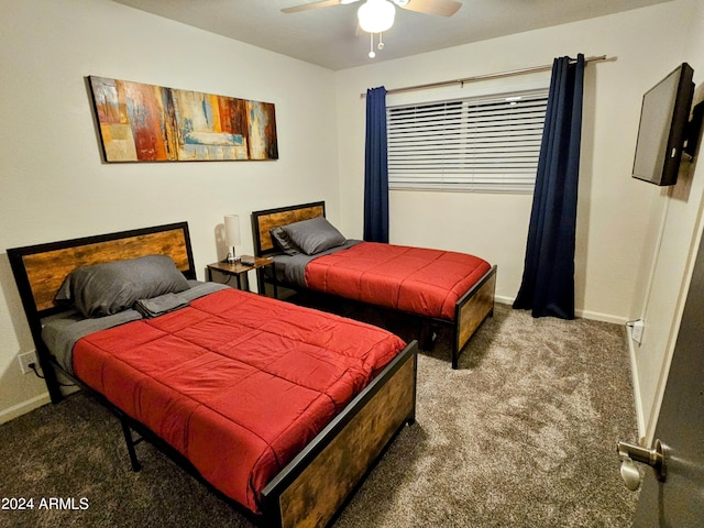 1801 N 87th Pl, Scottsdale, AZ 85257 - carpeted bedroom featuring baseboards and ceiling fan