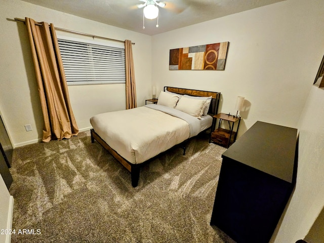 1801 N 87th Pl, Scottsdale, AZ 85257 - carpeted bedroom featuring baseboards and a ceiling fan