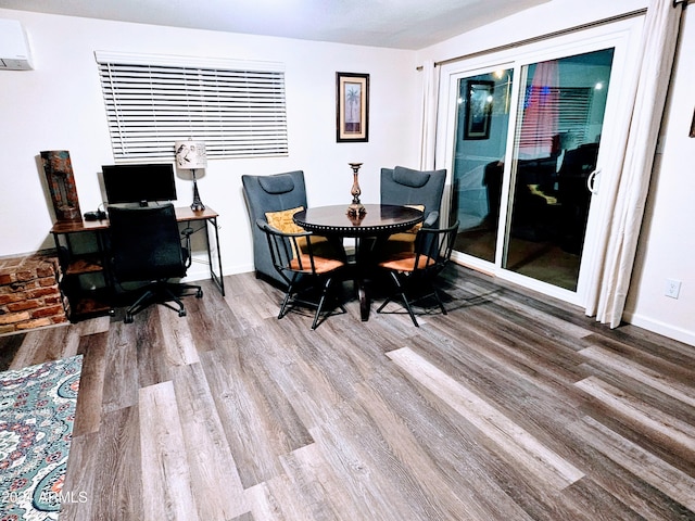 1801 N 87th Pl, Scottsdale, AZ 85257 - dining room with wood finished floors, a desk, and a wall mounted air conditioner