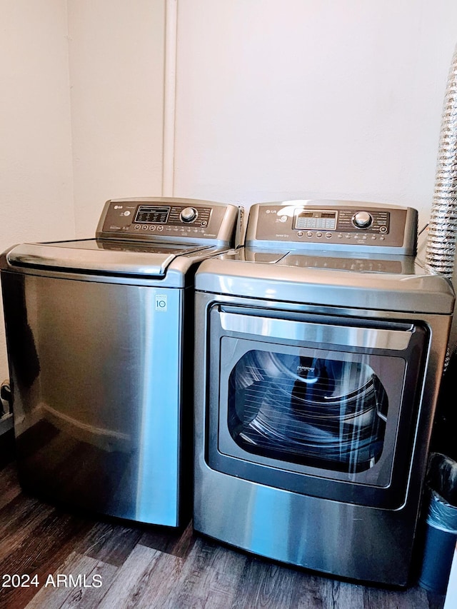 1801 N 87th Pl, Scottsdale, AZ 85257 - laundry room with washer and clothes dryer and dark wood-style flooring