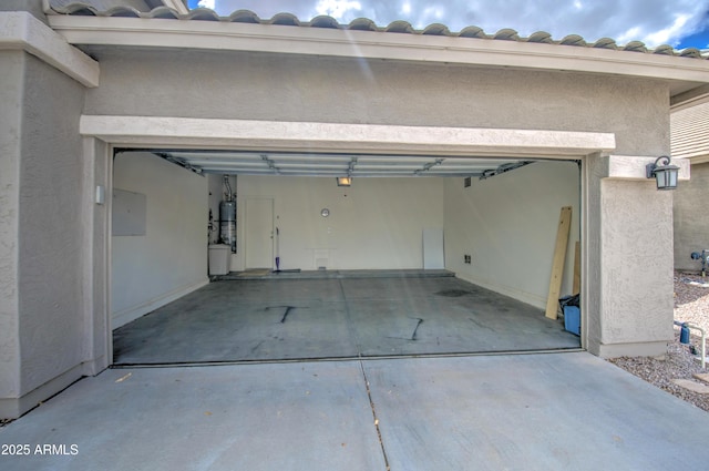 garage featuring strapped water heater