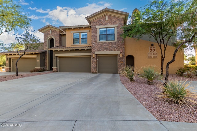 view of front of property featuring a garage